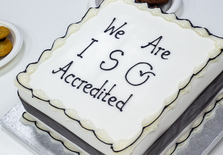 Cake with the text - we are ISO accredited